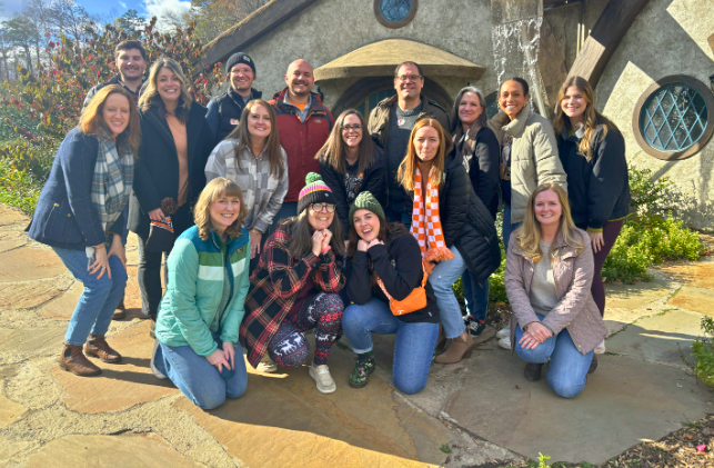 Group of friends at Ancient Lore Village Firepit